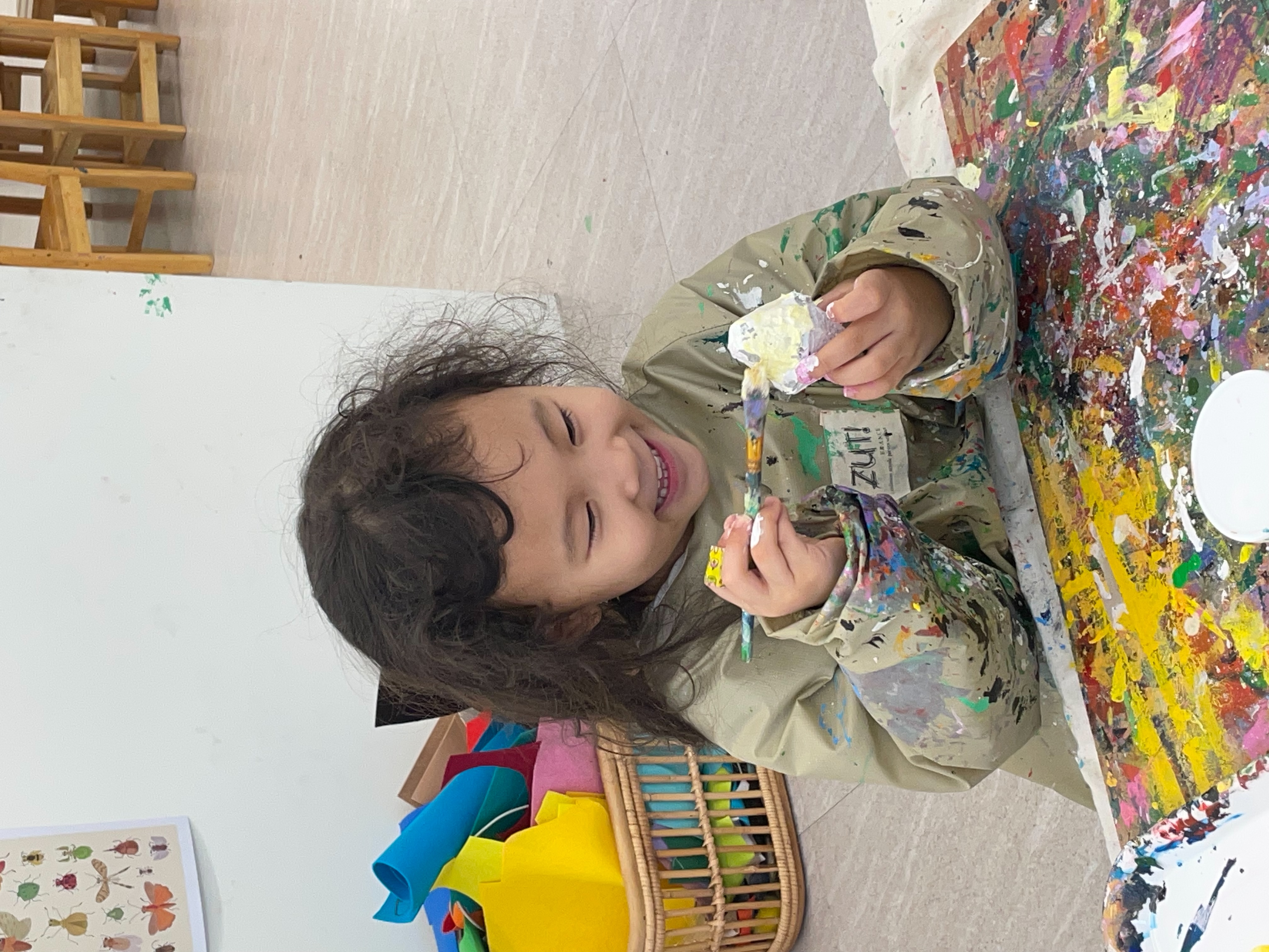 Pure joy! Getting messy with paint at the art studio